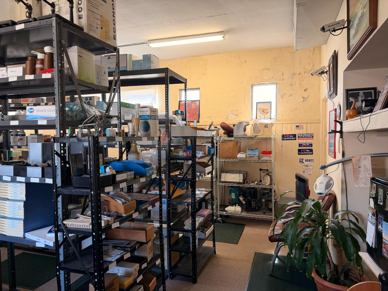 Interior of O'Meara Dental showing extensive inventory